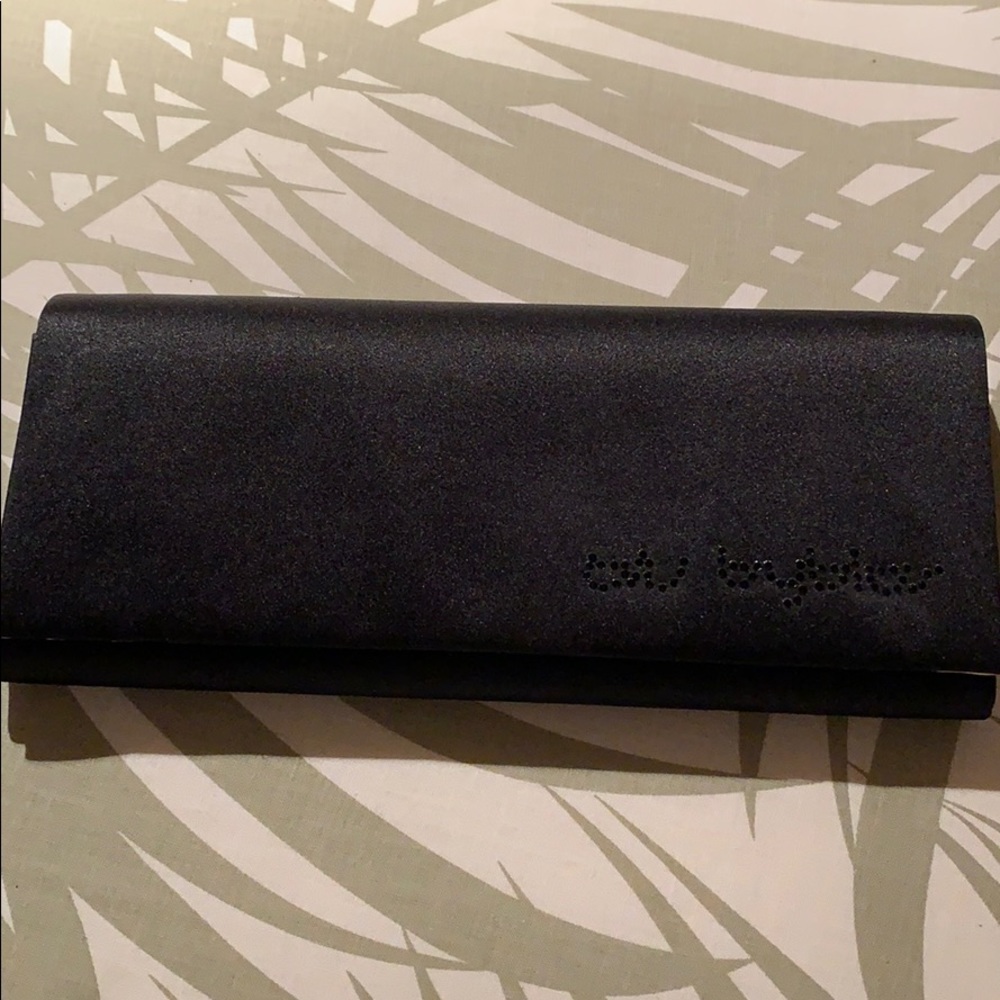 Black skinny clutch